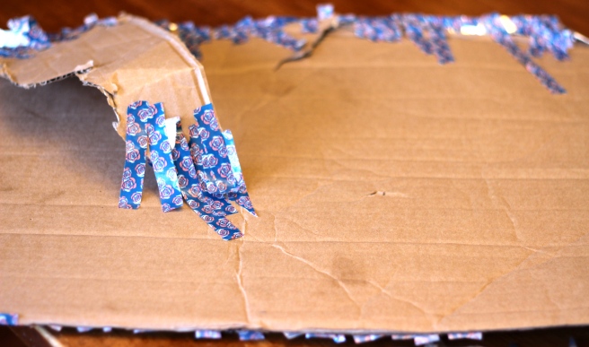washi tape on cardboard shield 1